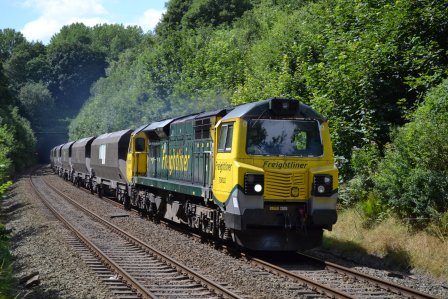 Freight train 70002 approaches Runcorn East on 18th July 2014